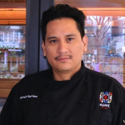 Portrait of Chef Osvaldo Sánchez from Agave Uptown restaurant